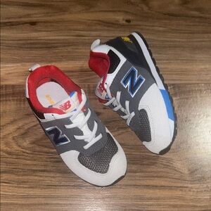 New Balance Toddler Black, White, and Blue Sneakers